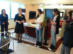 The Director of HR and an Officer of HR greeting t